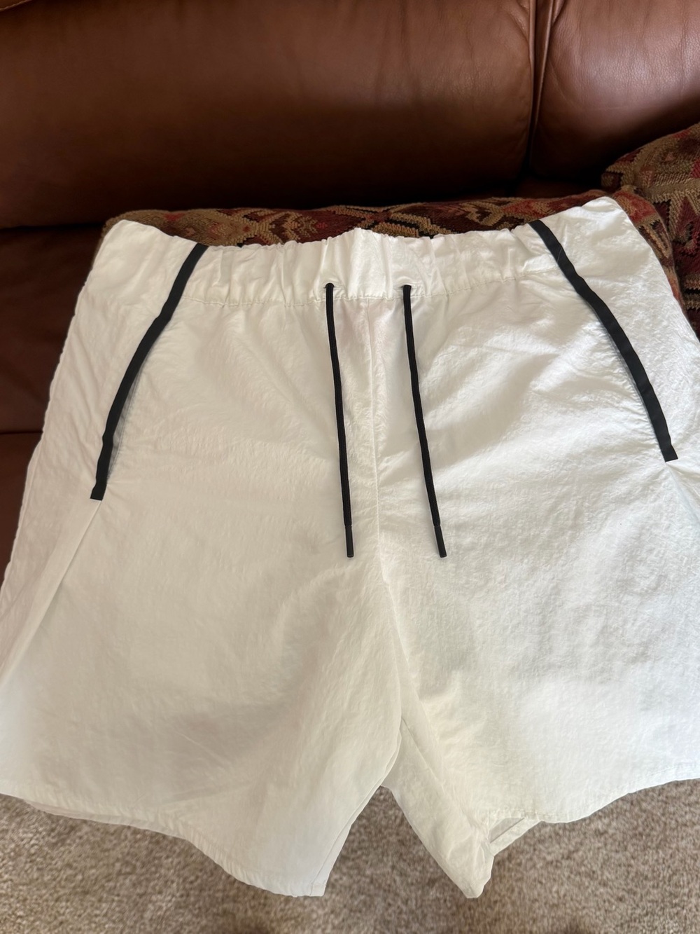 Nike White Athletic Shorts with Black Drawstrings